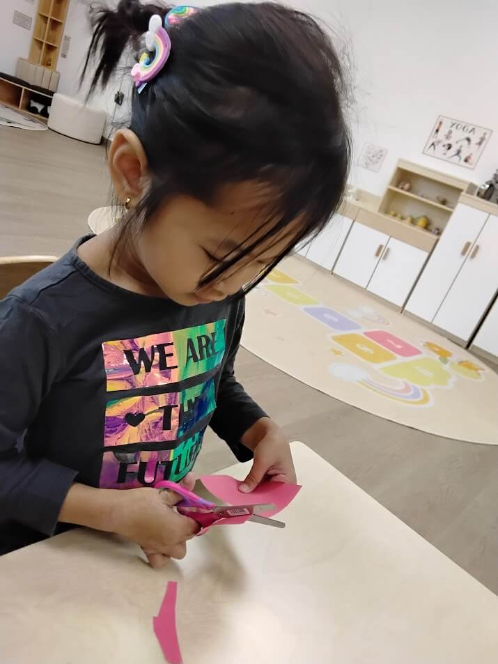 Kid making art